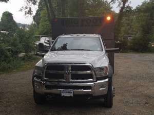 front of big foot tree service truck